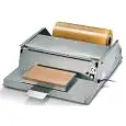 MACHINE D'EMBALLAGE - MOD. DISP INOX - DISTRIBUTEUR FILM ALIMENTAIRE THERMOSCELLEUSE  INOX - Plan chauffant cm 30x17,5 - Rouleau film Cm. 45 - Alimentation  MONOPHASÉ 230/50/1 - Norme CE