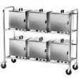CHARIOT PORTE BOÎTES, CHAUFFE ASSIETTE - MOD. CPC600 - Structure en tuyau d'acier inox de 25x25 cm - Glissières pour contenir n. 6 tiroirs thermiques avec relatives prises de courant - DIM. 155 x 61 x h 132 cm