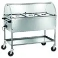 CHARIOT THERMIQUE BAIN MARIE - AVEC CLOCHE SEMICIRCULAIRE - MOD. CT1760C - Structure en acier inox - Cuve à double paroi avec robinet - Thermostat réglable +30°/+90°C - Voltage V230 50/60 Hz  Dim. 117x67xh114